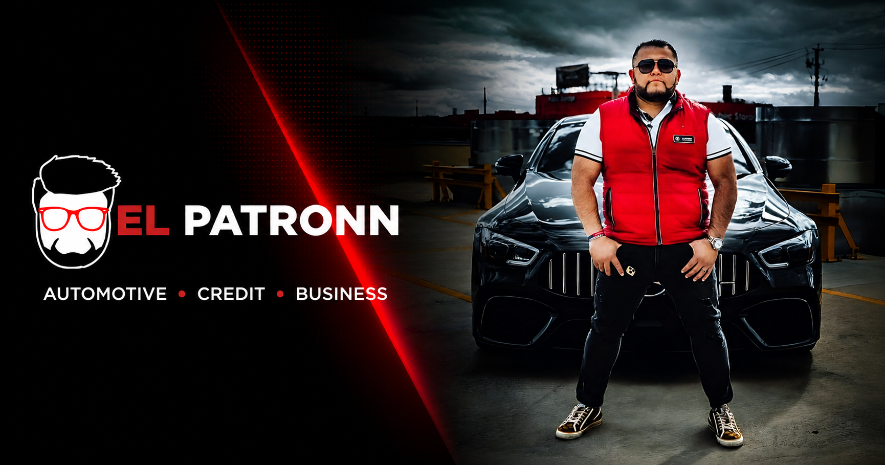 EL Patronn standing beside a red sports car